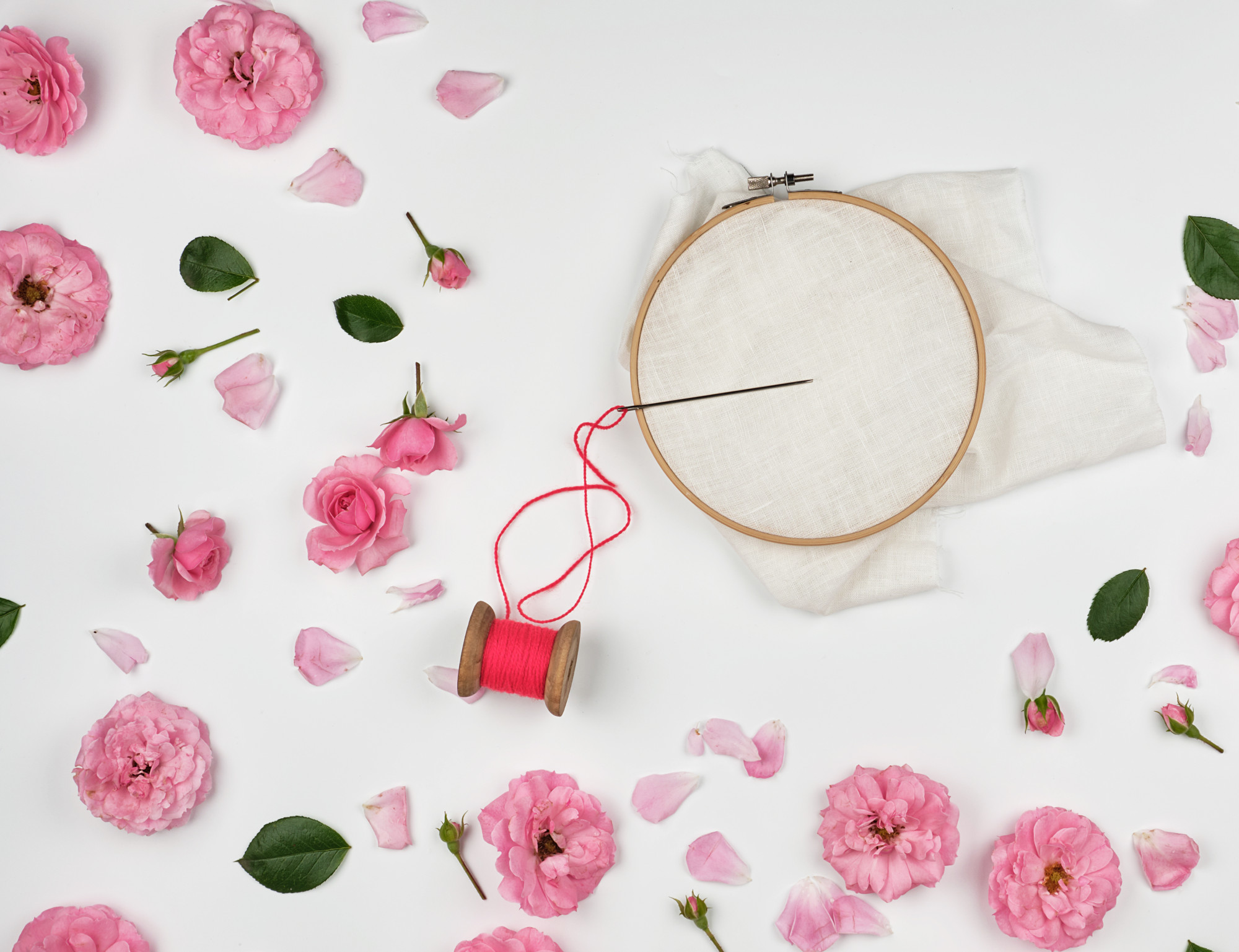 Close detail of floral stitchwork on cotton