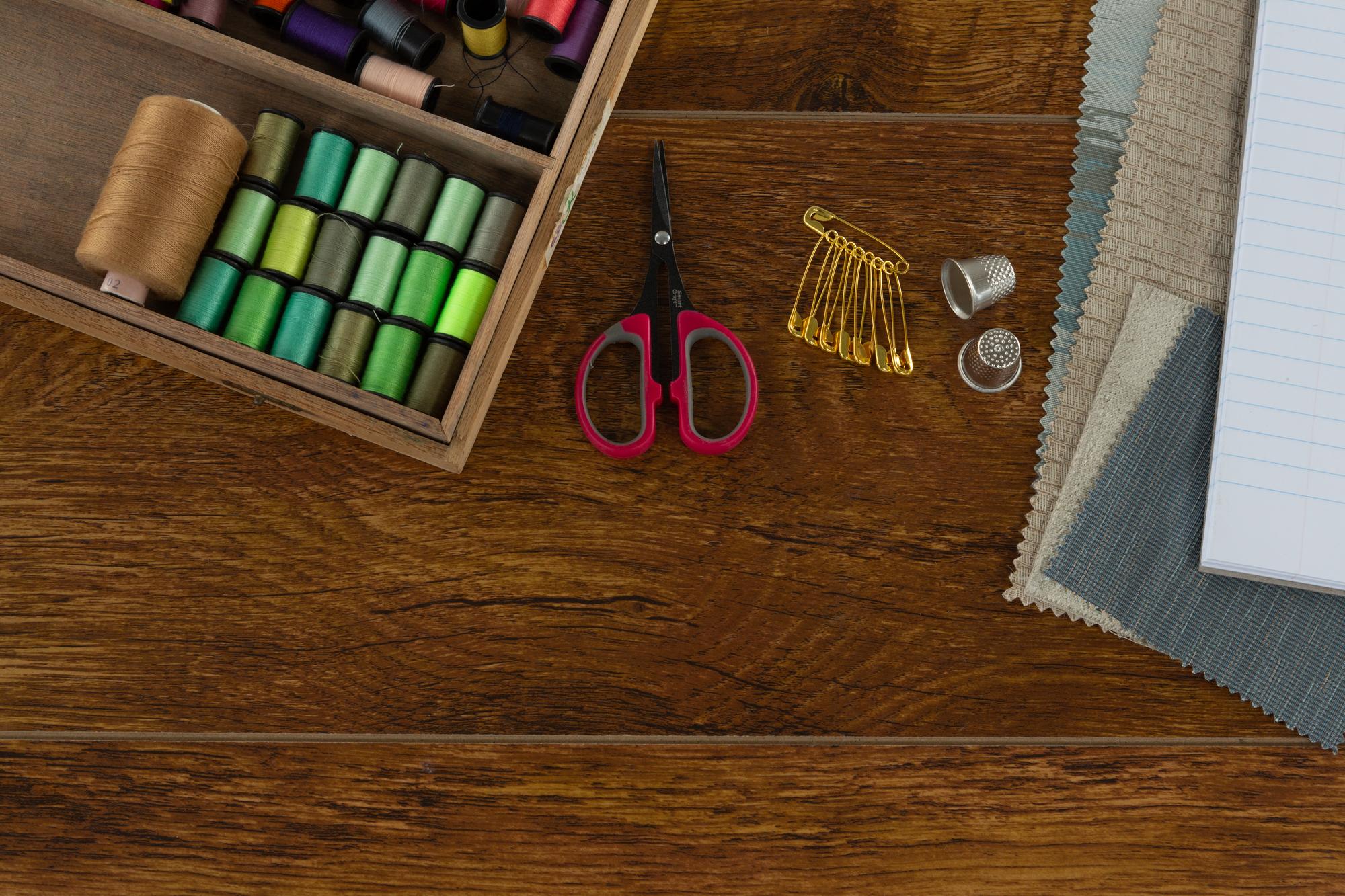 Thread palette and sample swatches on wood table